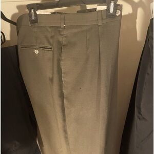 (9) Pair of pre-owned men’s slacks. sized 36x30 and 38x30